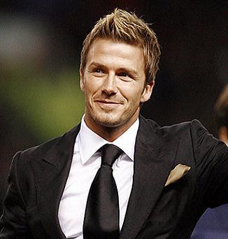 David Beckham ayudar a llevar la antorcha olmpica